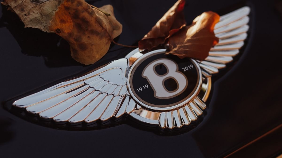 Bentley: And not many know that there are uneven number of feathers on either side of the wing, and while many others have changed their logos, Bentley's logo has remained unchanged since their beginning. Credit: Unsplash Photo