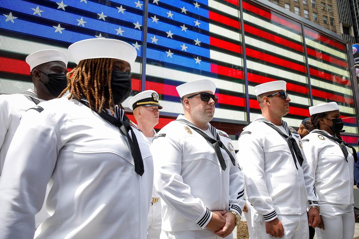 US Navy sailors attend an enlistment ceremony in Times Square during the annual Fleet Week in New York City. Credit: Reuters Photo