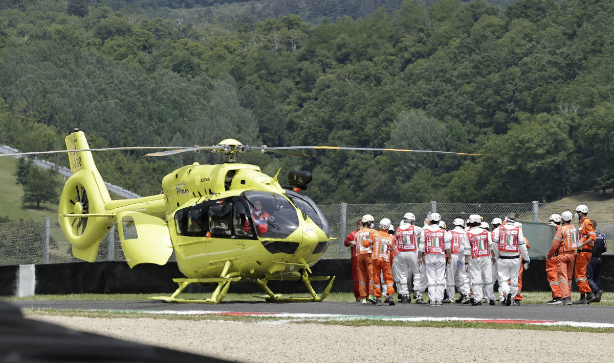 CarXpert PruestelGP's Jason Dupasquier is carried to an helicopter after sustaining an injury during Moto3 qualifying. Credit: Reuters Photo