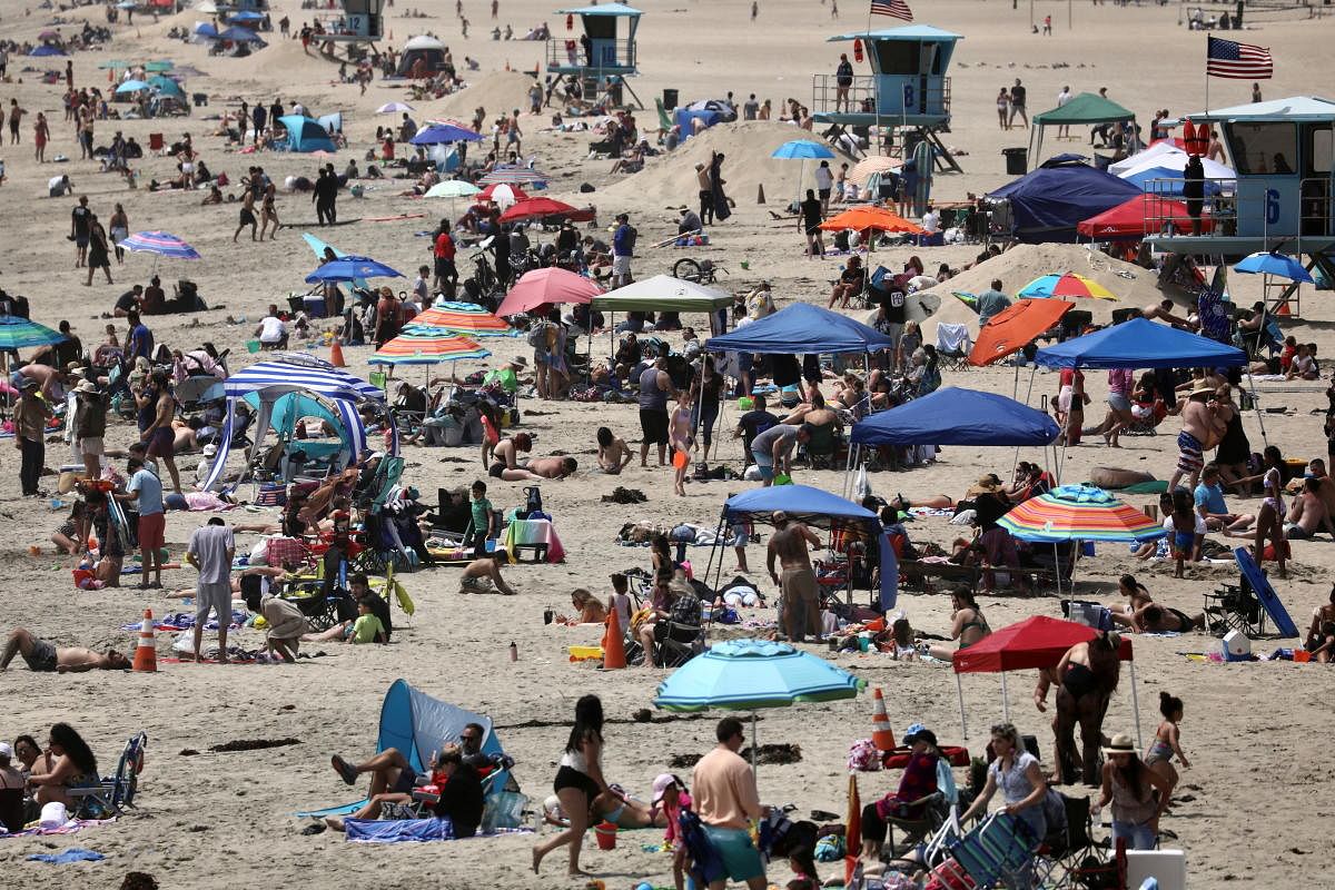 People flock to the beach to enjoy the Memorial Day long weekend, in Santa Monica, California, US. Credit: Reuters Photo