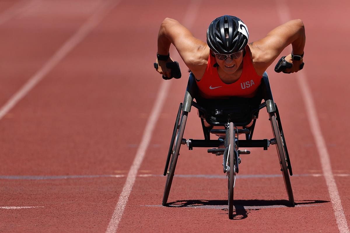 Cheri Madsen competes in the Womens 400 Meter Dash Wheelchair T54 final during the Desert Challenge Games at Westwood High School. Credit: AFP Photo