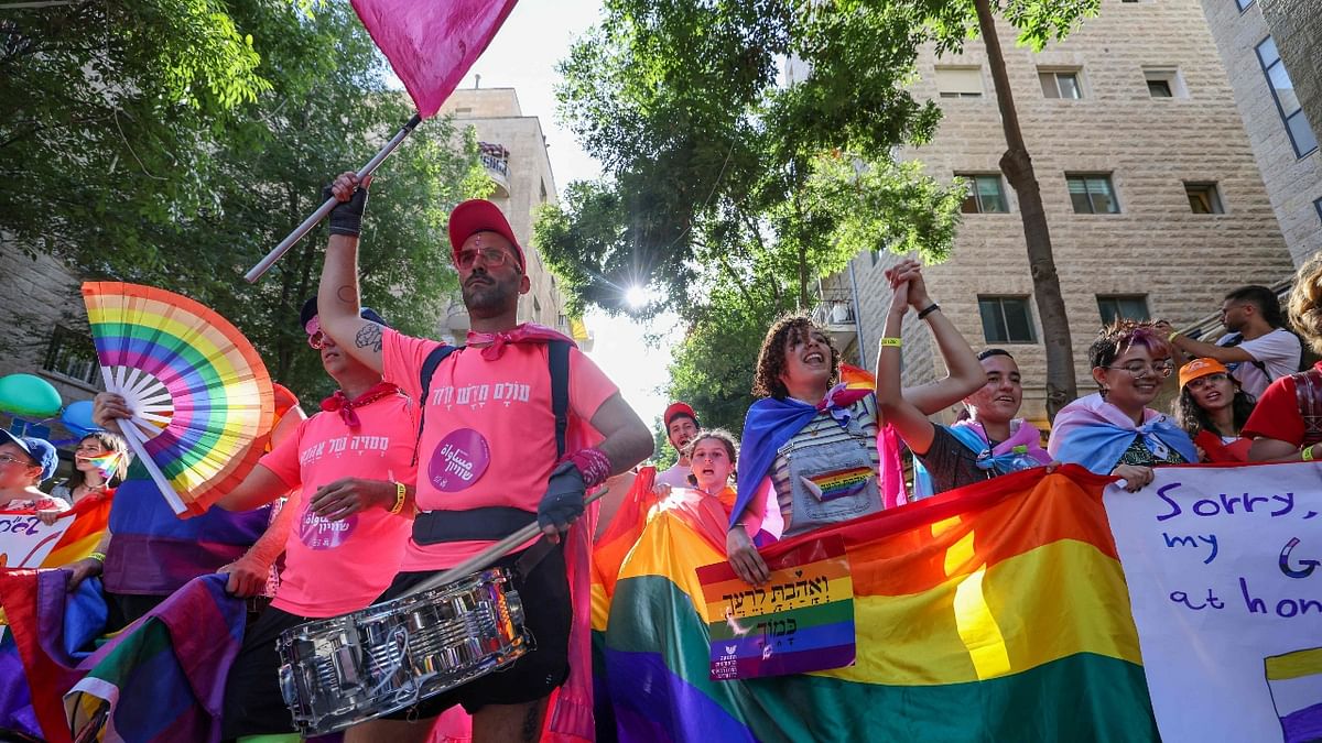 Some 3,000 police officers lined the route as marchers waved rainbow flags, placards and balloons, and several streets were blocked off and a helicopter circled over the city centre. Credit: AFP Photo