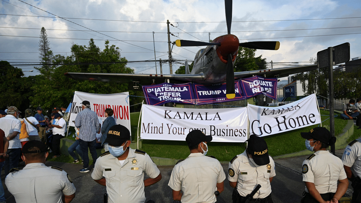 People take part in a demonstration against the visit of the United States Vice-President Kamala Harris, outside the Air Force Base in Guatemala City. Credit: AFP Photo