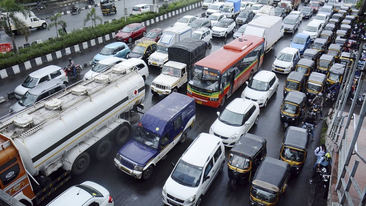 Buses of the Brihanmumbai Electric Supply and Transport (BEST), the city civic body's transport wing, were allowed to ferry passengers with 100 per cent seating capacity, though local trains were restricted for those working in medical and essential services. Credit: PTI