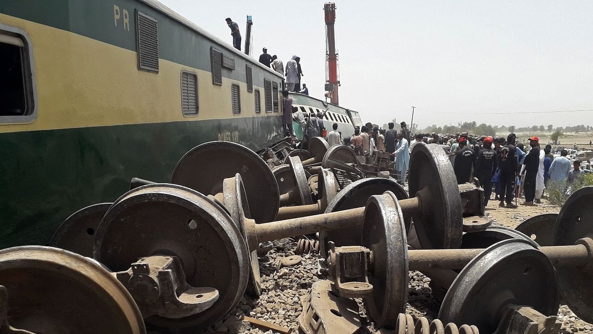 A Pakistani train smashed into derailed carriages from another train, killing at least 51 people, government officials said, in the latest accident to highlight the perilous state of a more-than-150-year-old railway system. Credit: AFP Photo