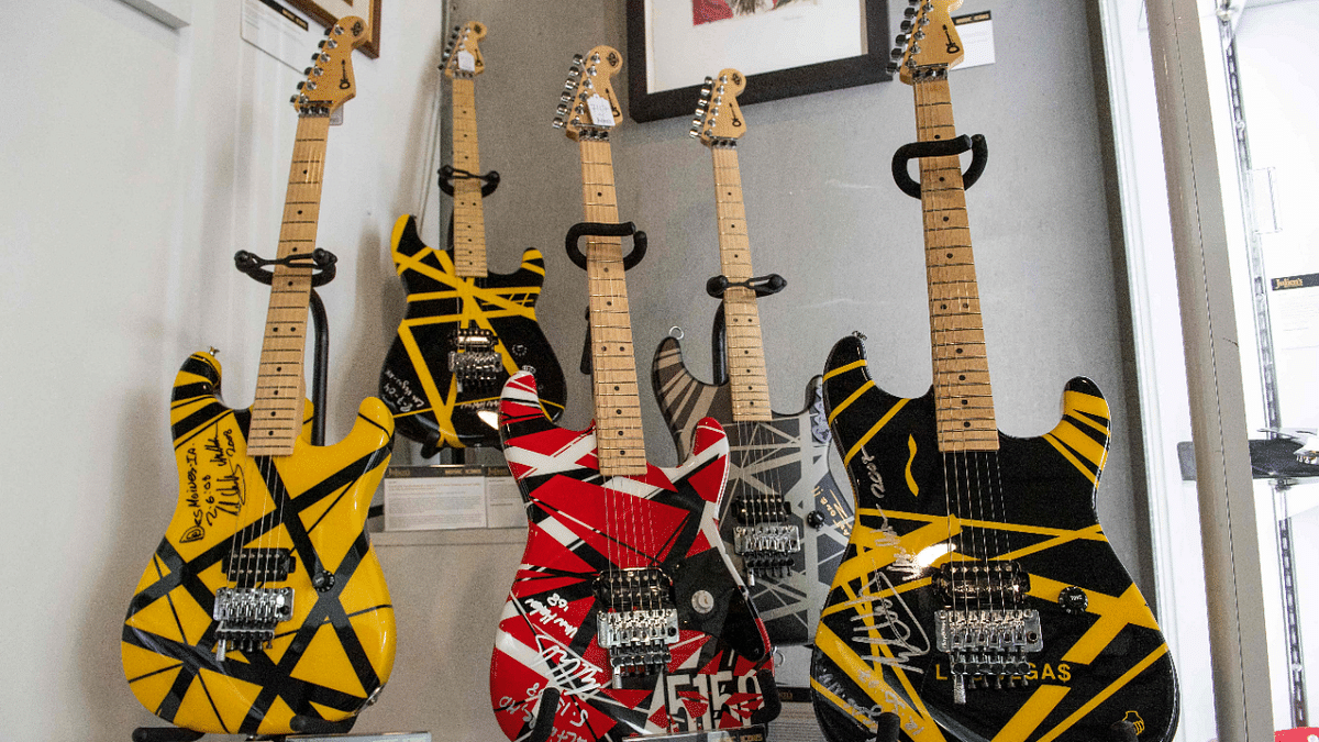 Eddie Van Halen designed and stage played Charvel EVH Art Series Electric guitars are seen at a preview of of Julien's Auctions 'Music Icons' auction in Beverly Hills, California. Credit: AFP Photo