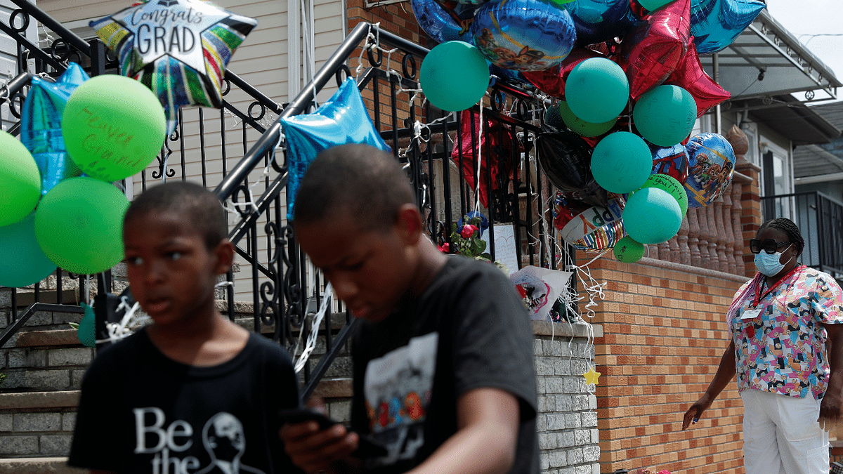 A makeshift memorial for a 10-year-old boy who was shot and killed is seen outsid a home in New York City. Credit: Reuters Photo