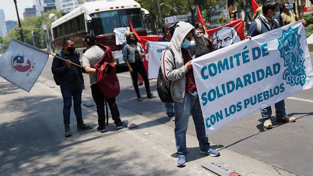 Members of the Mexican Communist Party protest outside the Sofitel Hotel in rejection of the visit of US Vice President Kamala Harris to Mexico City, Mexico. Credit: Reuters Photo
