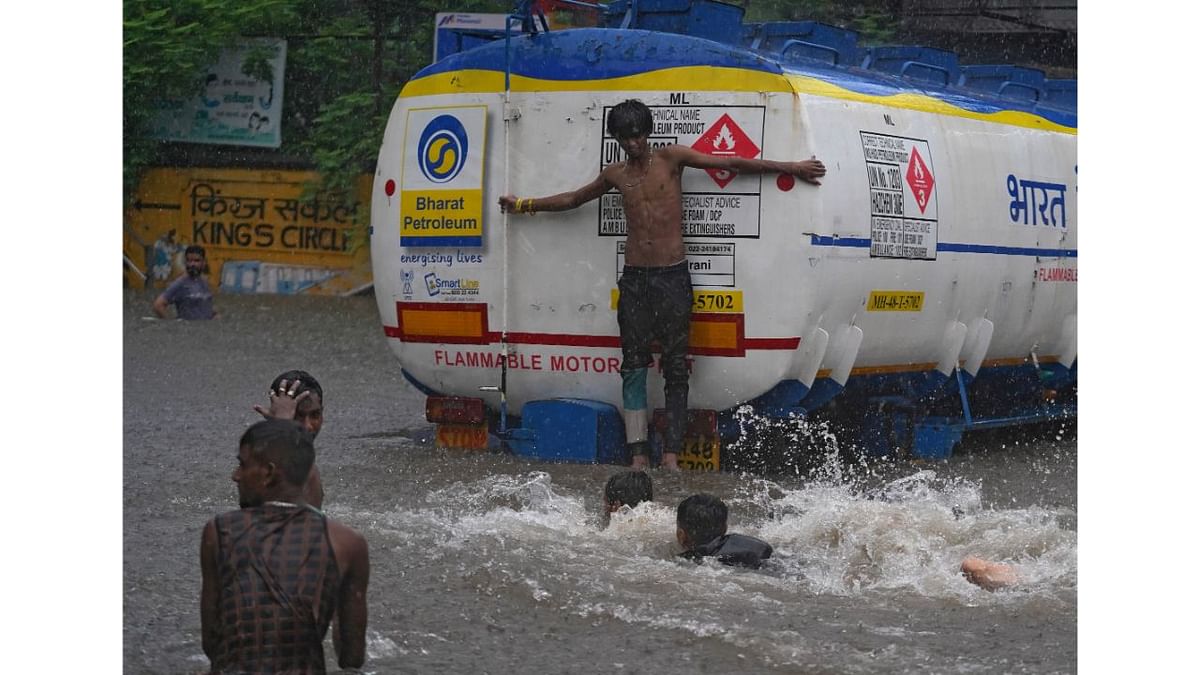 The India Meteorological Department (IMD) issued a 'red alert' for Mumbai, and neighbouring Thane, Palghar and Raigad districts, warning of very heavy to extremely heavy rainfall at isolated places there. Credit: Reuters Photo