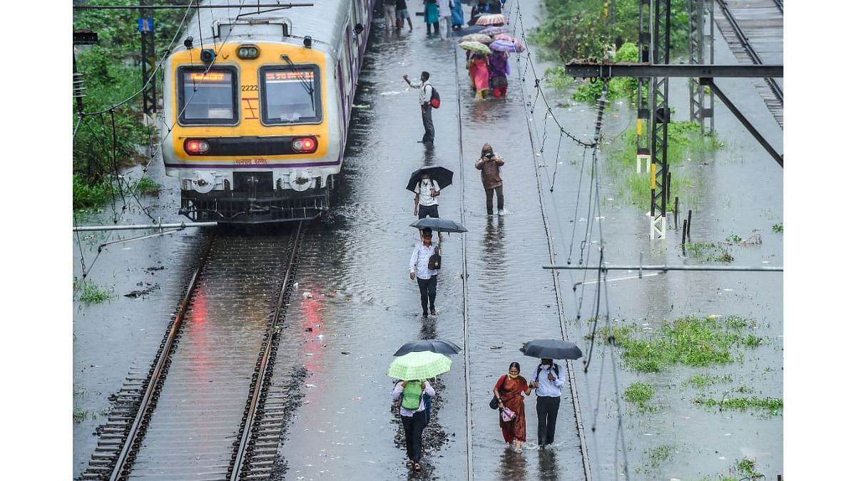 The heavy downpour also disrupted local train services, which are running only for personnel engaged in health and other essential services, and are out of bound for general commuters in view of the Covid-19 pandemic. Credit: PTI Photo