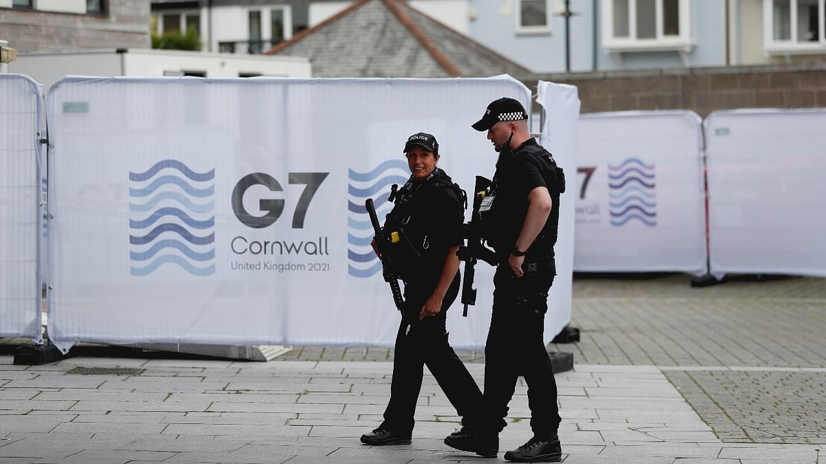 Police officers walk outside the National Maritime Museum as preparations are underway for the G7 leaders summit, Falmouth, Cornwall, Britain. Credit: Reuters Photo