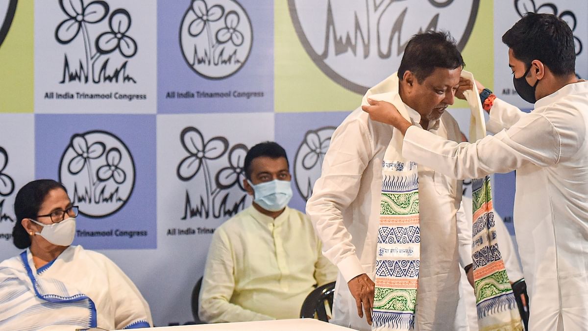 In Pics | BJP leader Mukul Roy, his son Subranshu join TMC after quitting BJP
