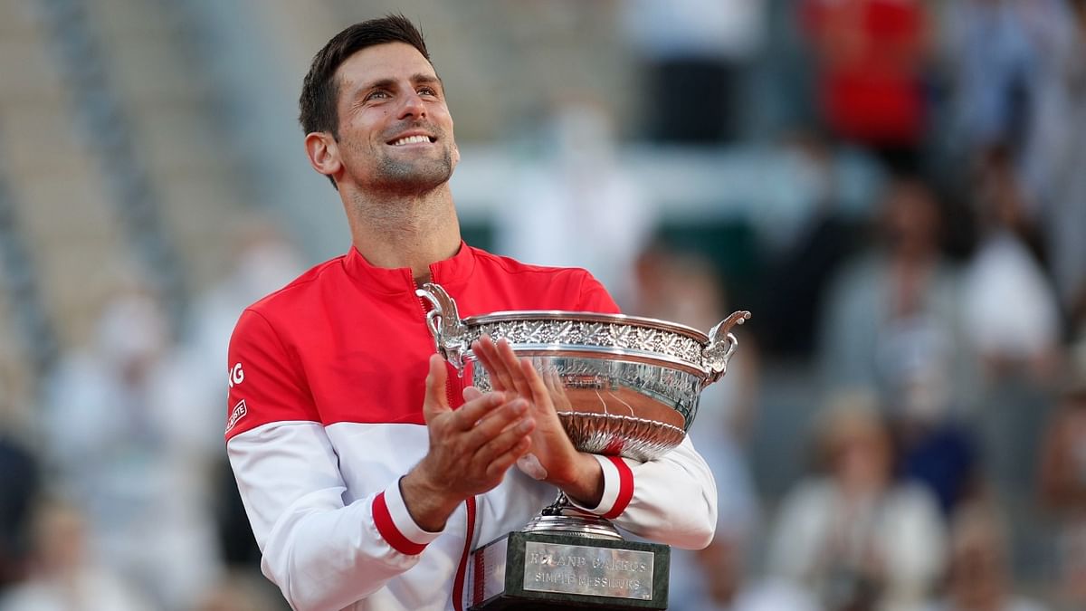 Serbia's Novak Djokovic celebrates with the trophy after winning the French Open against Greece's Stefanos Tsitsipas. Credit: Reuters Photo