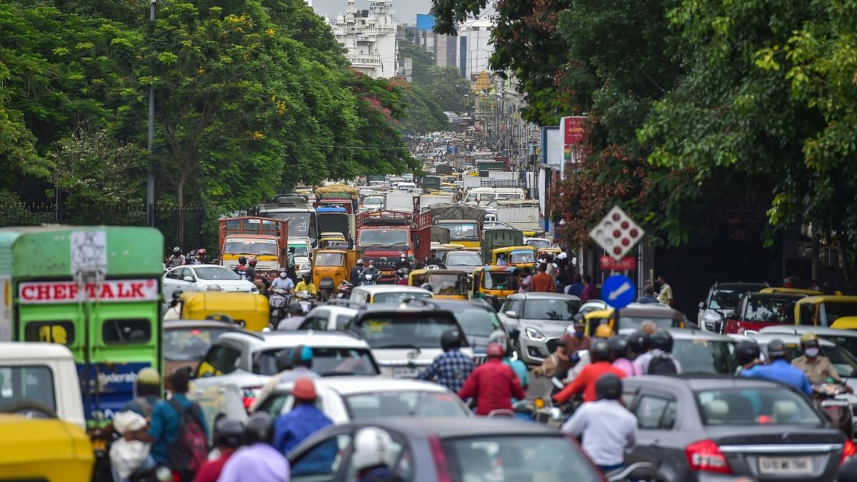 Hundreds of vehicles coming from the neighbouring Hosur in Krishnagiri district of Tamil Nadu were seen stuck in long queues at Attibele in Bengaluru. There was a chock-a-block at Freedom Park, Seshadripuram, Malleswaram, Town Hall, Richmond Road and Kempe Gowda Road right in the middle of the city as well. Credit: PTI Photo