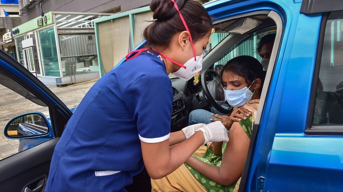 About 80 people who registered for Covishield turned up to get the jab, while 65 who registered for Covaxin drove in to get the injection. Credit: PTI Photo