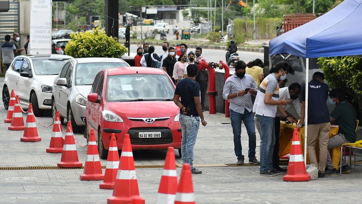 Hundreds get vaccinated in drive-through event in Bengaluru; see pics