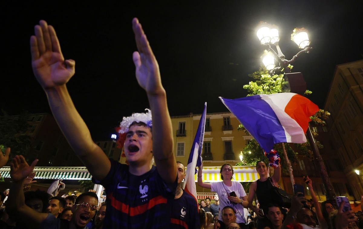 France fans celebrate after watching the UEFA EURO 2020 France vs Germany match on a screen, in Nice, France. Credit: Reuters Photo