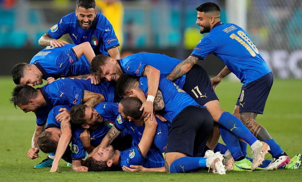 Italy's players celebrate their win after the UEFA EURO 2020 Group A football match between Italy and Switzerland at the Olympic Stadium in Rome. Credit: AFP Photo