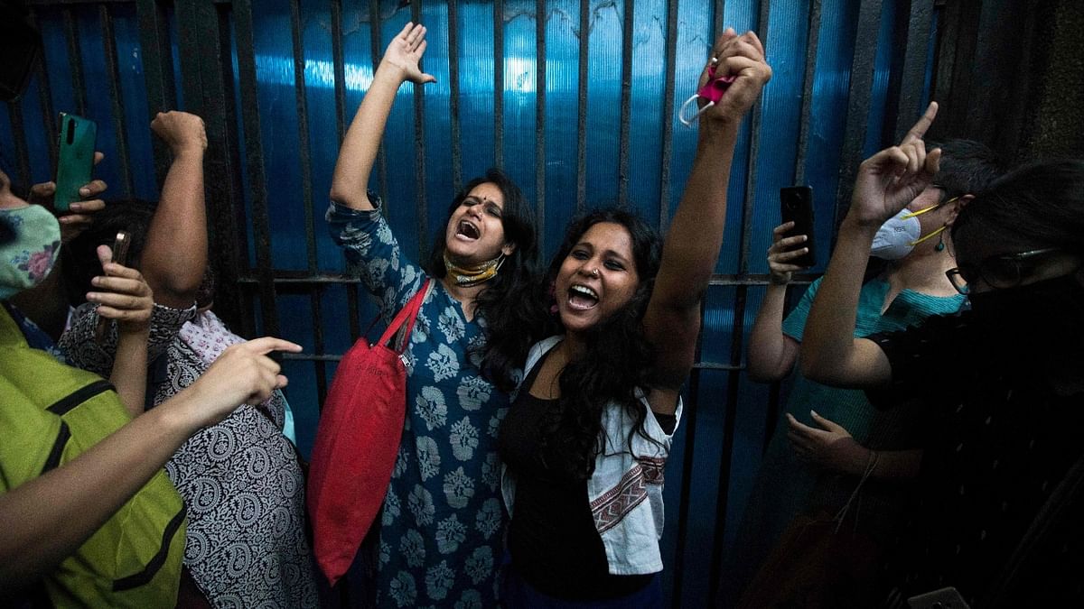 Student activists Natasha Narwal and Devangana Kalita get clicked outside Tihar jail, after a court ordered their immediate release in the north-east Delhi riots