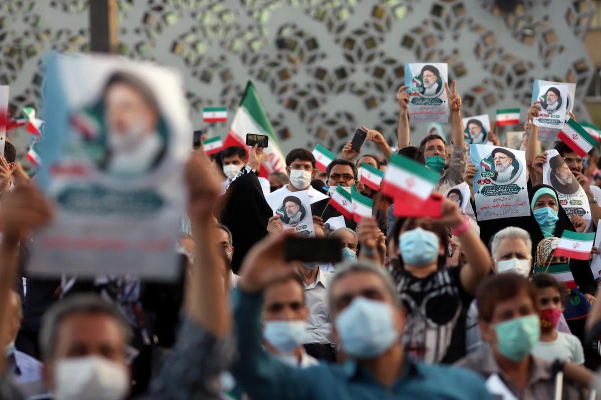 Supporters of Ebrahim Raisi celebrate his presidential election victory in Tehran, Iran. Credit: Reuters Photo