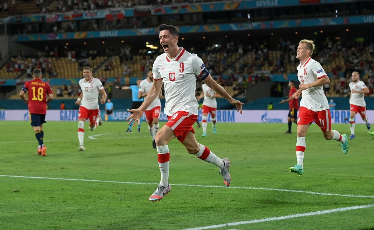 Poland's forward Robert Lewandowski celebrates after scoring a goal during the UEFA EURO 2020 Group E football match between Spain and Poland at La Cartuja Stadium in Seville, Spain. Credit: AFP Photo