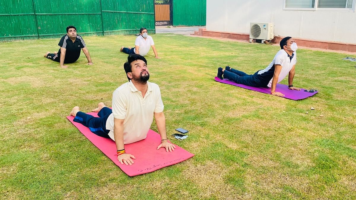 MoS Finance and Corporate Affairs, Anurag Thakur performs 'surya namaskar' at his residence in Delhi. Credit: Twitter/@ianuragthakur