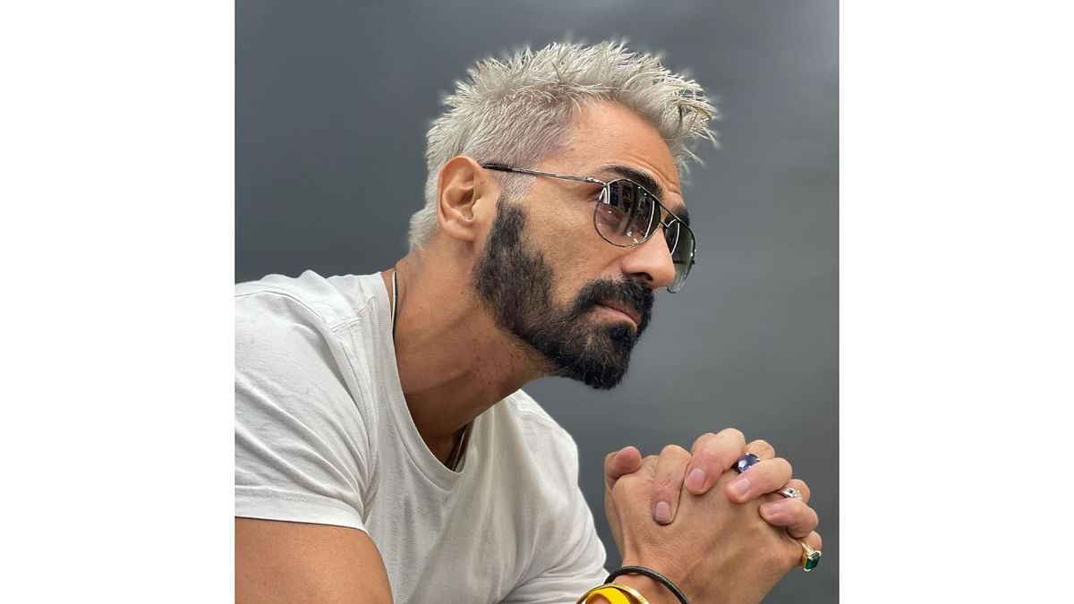 Bollywood actor Arjun Rampal surprised his fans with a new hairdo from his upcoming project. He was seen flaunting platinum blonde hair on social media.