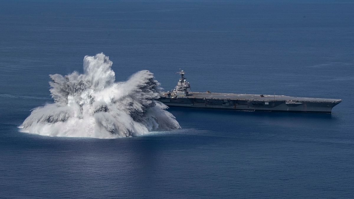 In this handout image courtesy of the US Navy the aircraft carrier USS Gerald R. Ford (CVN 78) completes the first scheduled explosive event of Full Ship Shock Trials while underway in the Atlantic Ocean. Credit: AFP Photo/US Navy/Jackson Adkins