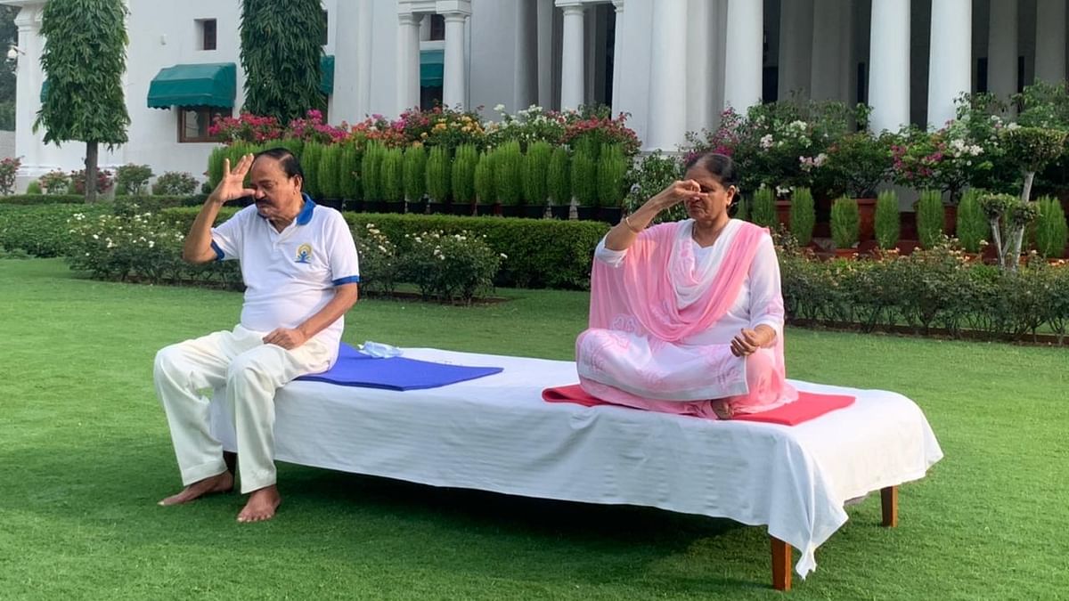 Vice president Venkaiah Naidu is seen performing pranayam with his wife at his official residence in New Delhi. Credit: Twitter/@VPSecretariat