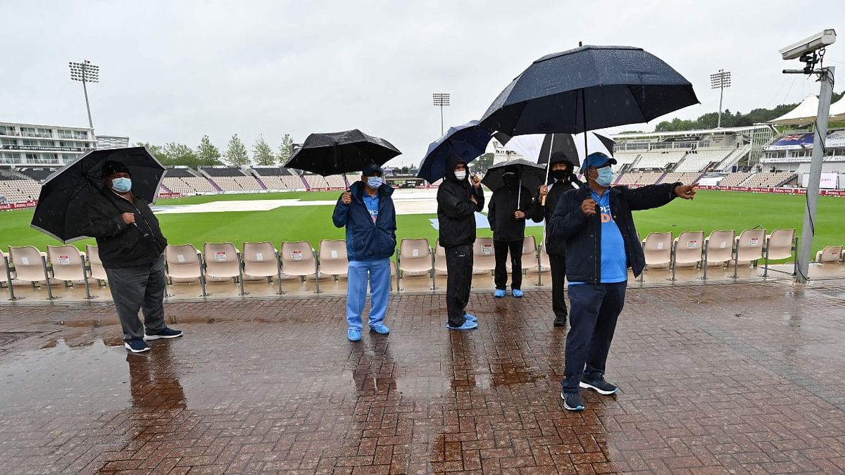 The play was finally abandoned for the day at 3:00 pm (1400 GMT), suffering similar fate as first day. Credit: AFP Photo