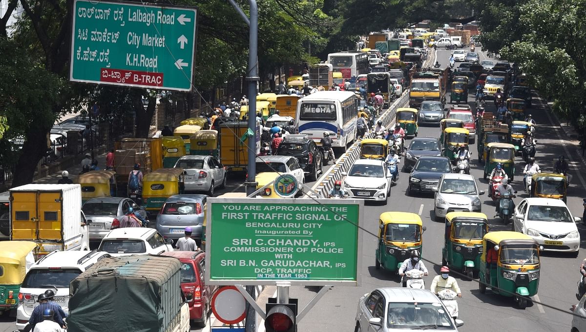 With the ease of Covid-induced lockdown restrictions, heavy traffic was witnessed at the several places in Bengaluru. Credit: DH Photo/SK Dinesh