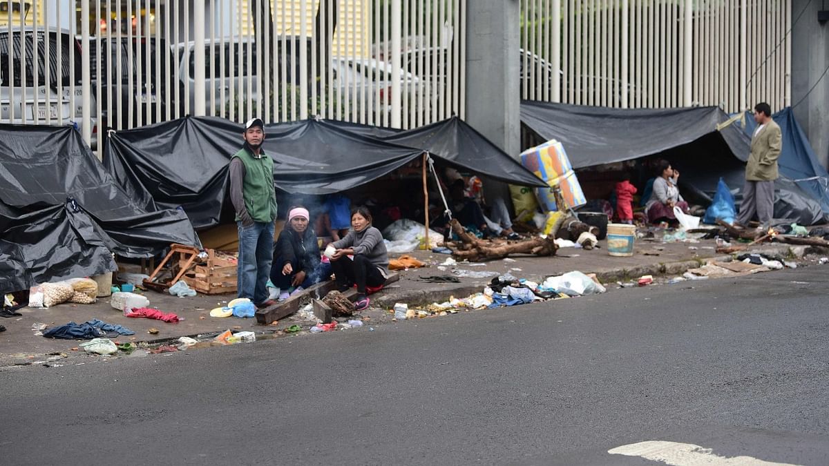Indigenous camp outside the Indigenous National Institute (INDI) to demand the resignation of his president, a better health care service, education and land to cultivate, in Asuncion. Credit: AFP Photo