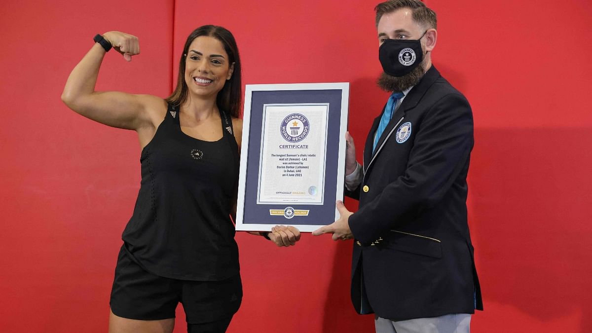 In Pics | Amputee athlete Darine Barbar sets Guinness World Record for longest static wall sit