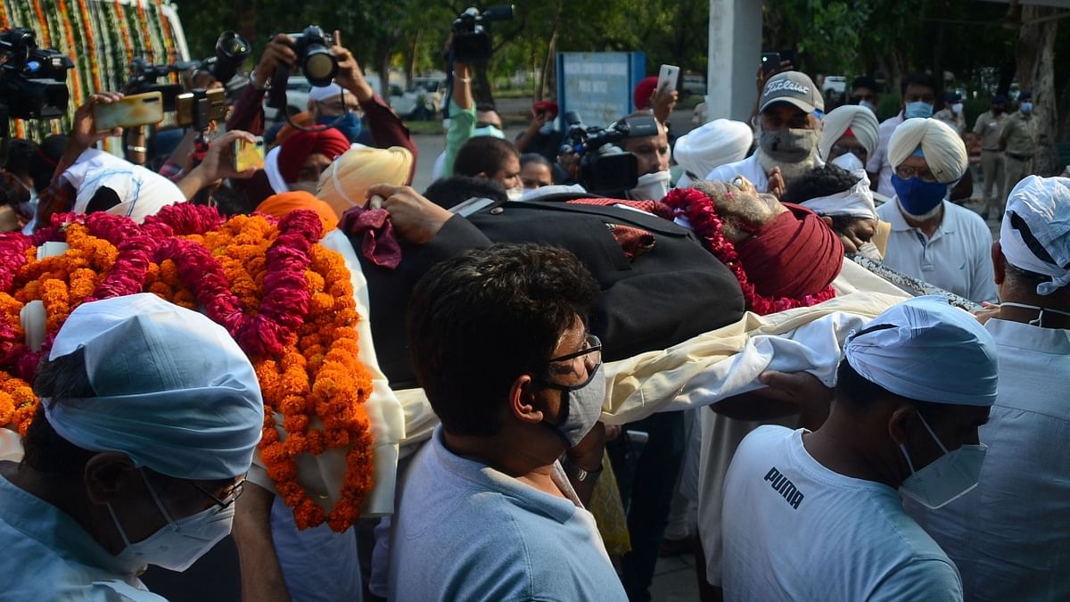 Iconic sprinter Milkha Singh was cremated with full state honours in Chandigarh, marking the end of an era in which his pioneering accomplishments on the track galvanised a newly-independent India. Credit: PTI Photo