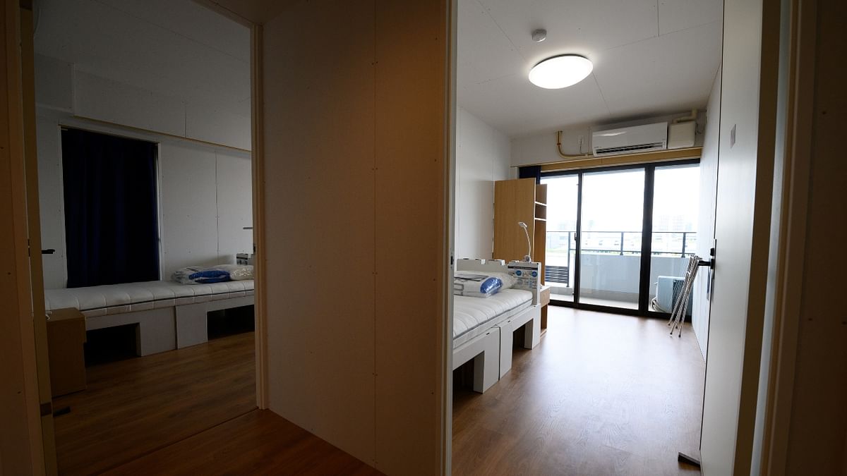 General view of bedrooms in a residential unit for athletes. The apartment complex abutting the shopping plaza was built on reclaimed land, and designed to house about 12,000 people in 23 buildings. It includes shops, a park and a school. The buildings will be converted into flats after the Olympics.