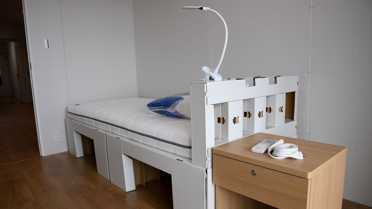 A recyclable cardboard bed and a mattress are pictured in a residential unit for the players. After the Olympics, it will be dismantled and the timber returned to the donating cities for re-use in local facilities.