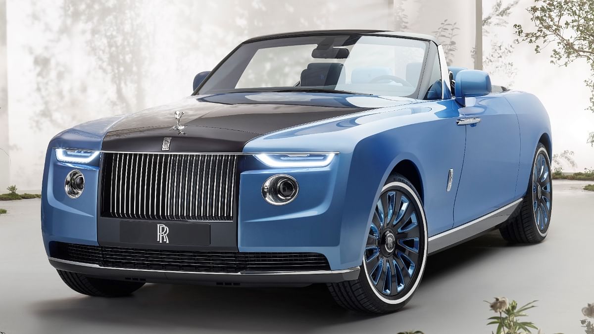 A convertible Rolls-Royce with a back deck that opens up to reveal cocktail tables, fridges for champagne and a parasol matching the vehicle's baby blue colour scheme is now a reality - for one ultra-wealthy individual.