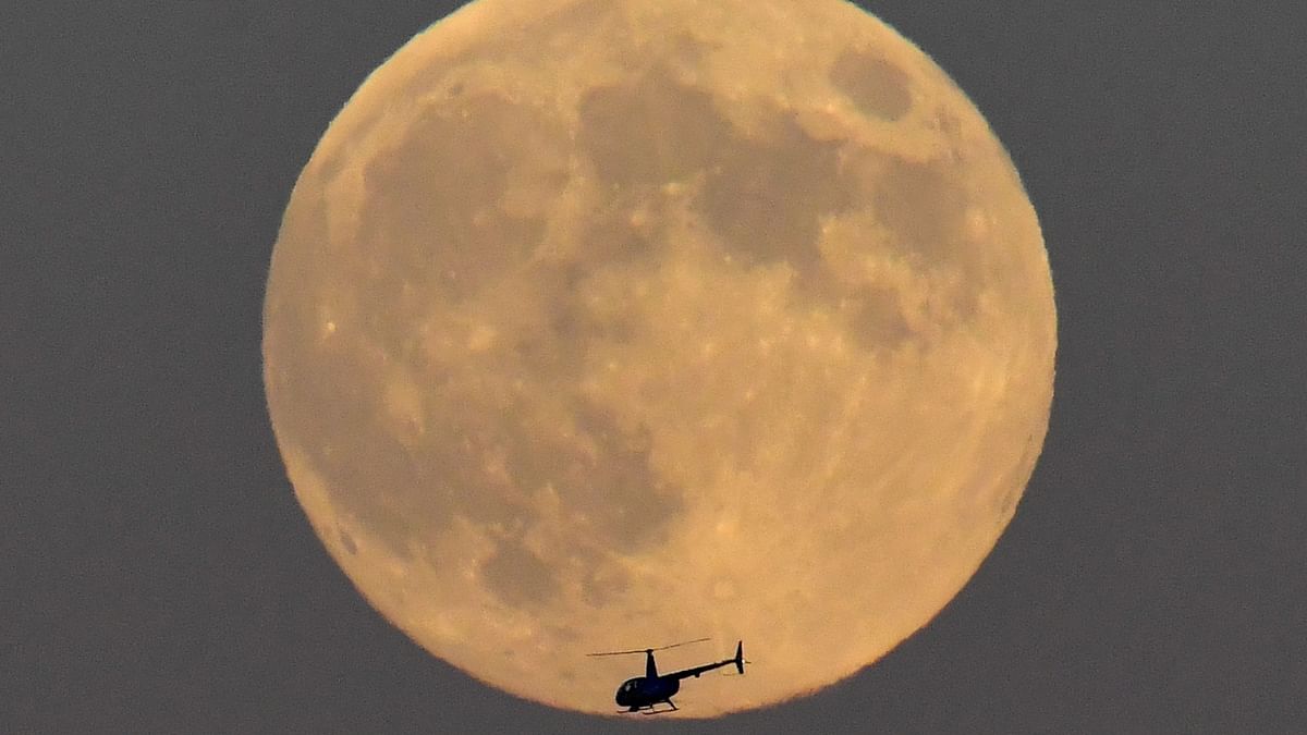 The celestial event is called Strawberry Moon as it marks the beginning of ripening of berries, blackberries or raspberries. Credit: Reuters Photo
