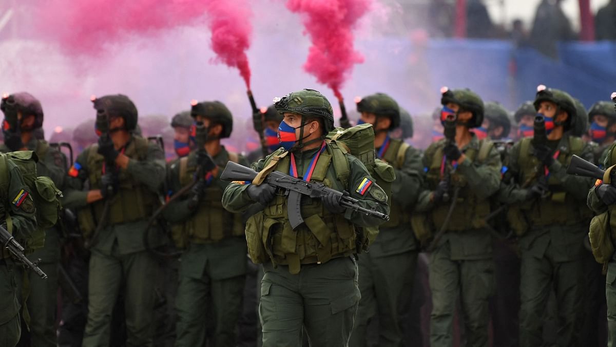 Venezuelan troops march during a military parade in the framework of the Carabobo Battle Bicentennial celebrations at the Carabobo military camp in Valencia, Carabobo state. Credit: AFP Photo