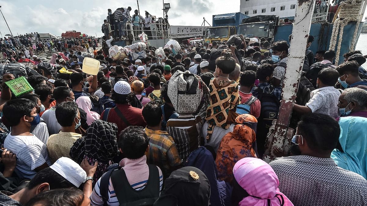 Tens of thousands of migrant workers fled Bangladesh's capital on Sunday, on the eve of a tightened lockdown that will curtail most economic activity and confine people to their homes as coronavirus infections soar.