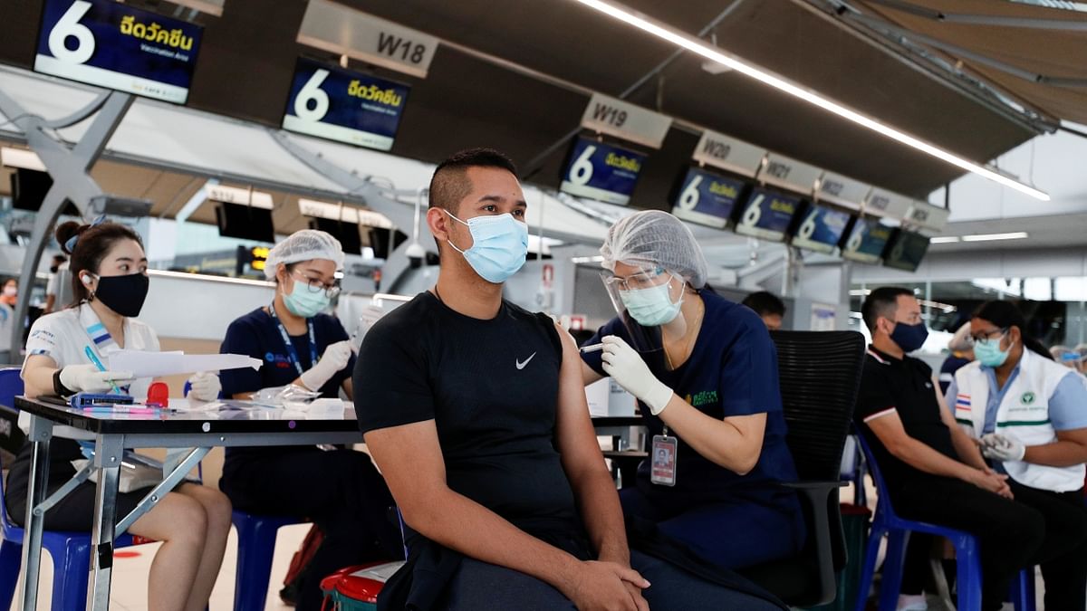 People get vaccinated against Covid-19 at Suvarnabhumi airport in Bangkok, Thailand. Credit: Reuters Photo