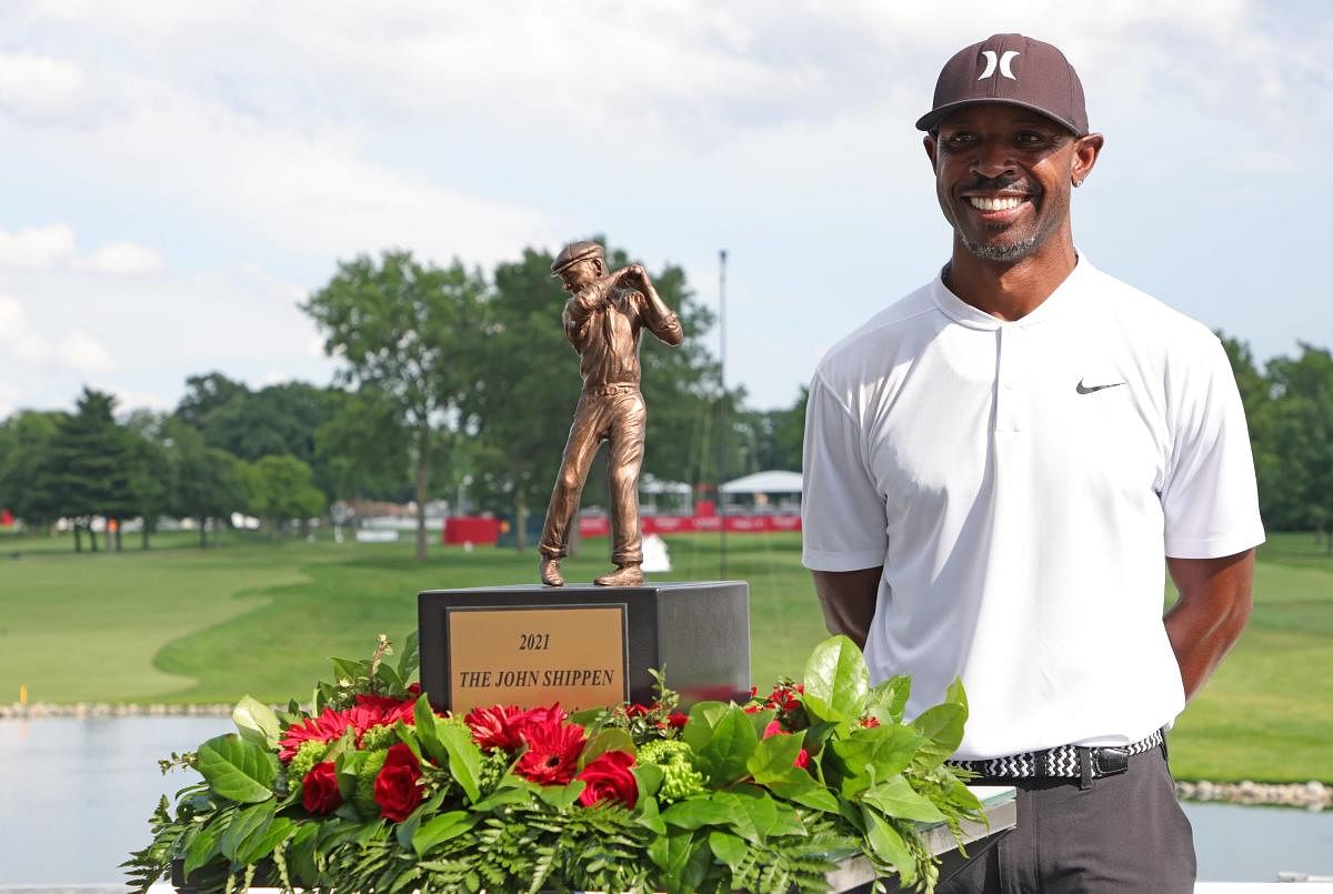 Timothy O'Neal, winner of The John Shippen National Invitational, poses with the trophy on June 28, 2021 at the Detroit Golf Club in Detroit, Michigan. Credit: AFP Photo