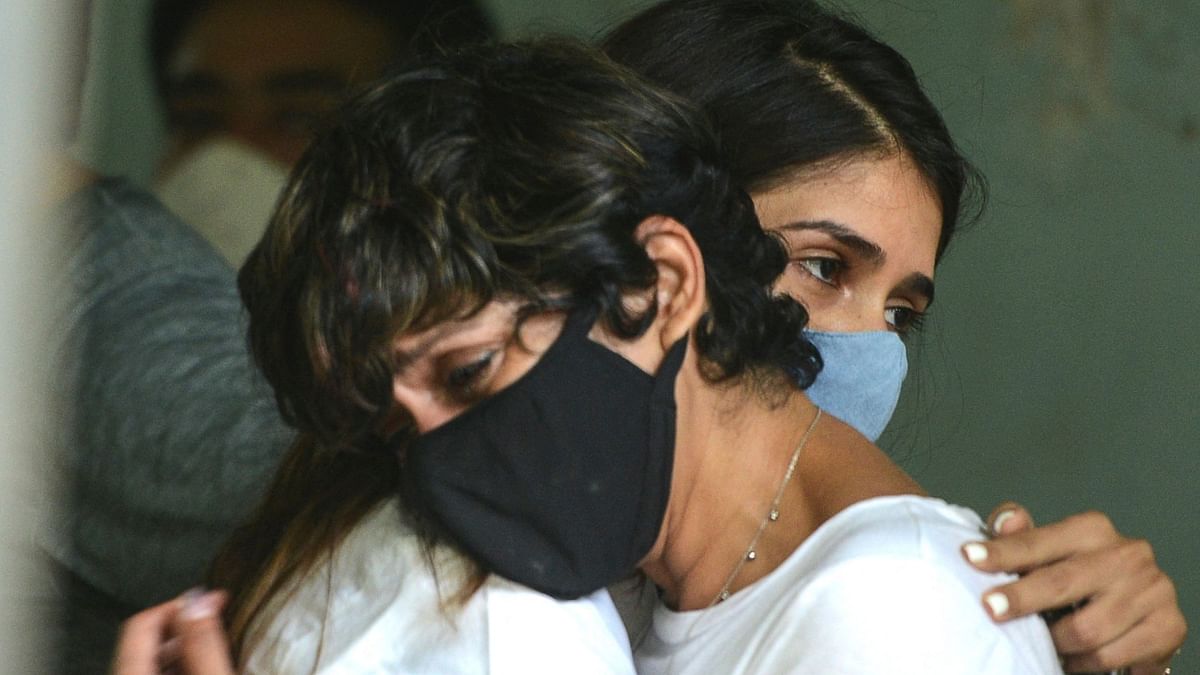 Mandira Bedi (L) grieves during the funeral of her husband and Bollywood film director and producer Raj Kaushal in Mumbai. Credit: AFP