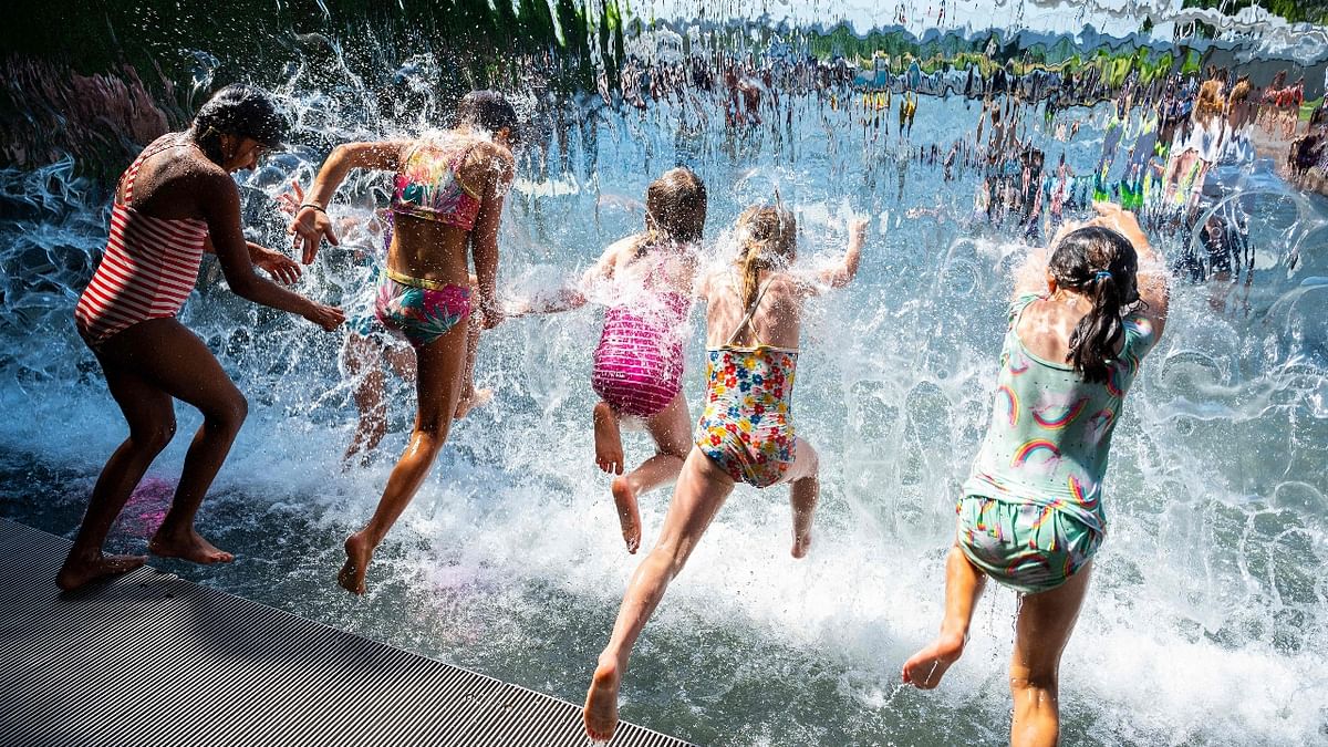 US heatwave: People enjoy in water park to get relief from the scorching heat
