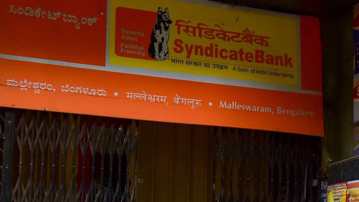 After its merger with Canara Bank, Syndicate Bank branches are all set to get new IFSC codes and account holders have been told to ensure they have the right code before making transactions | Credit: DH File Photo