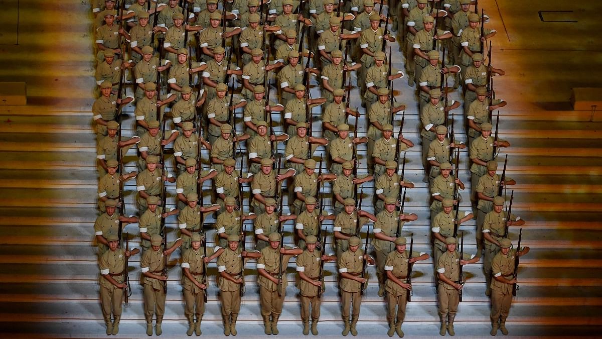 There was no military parade -- often expected in China on grand occasions -- but there was a flag-raising ceremony, a 100-gun salute, and promises to build the country's army into a world-class military force. Credit: AFP Photo