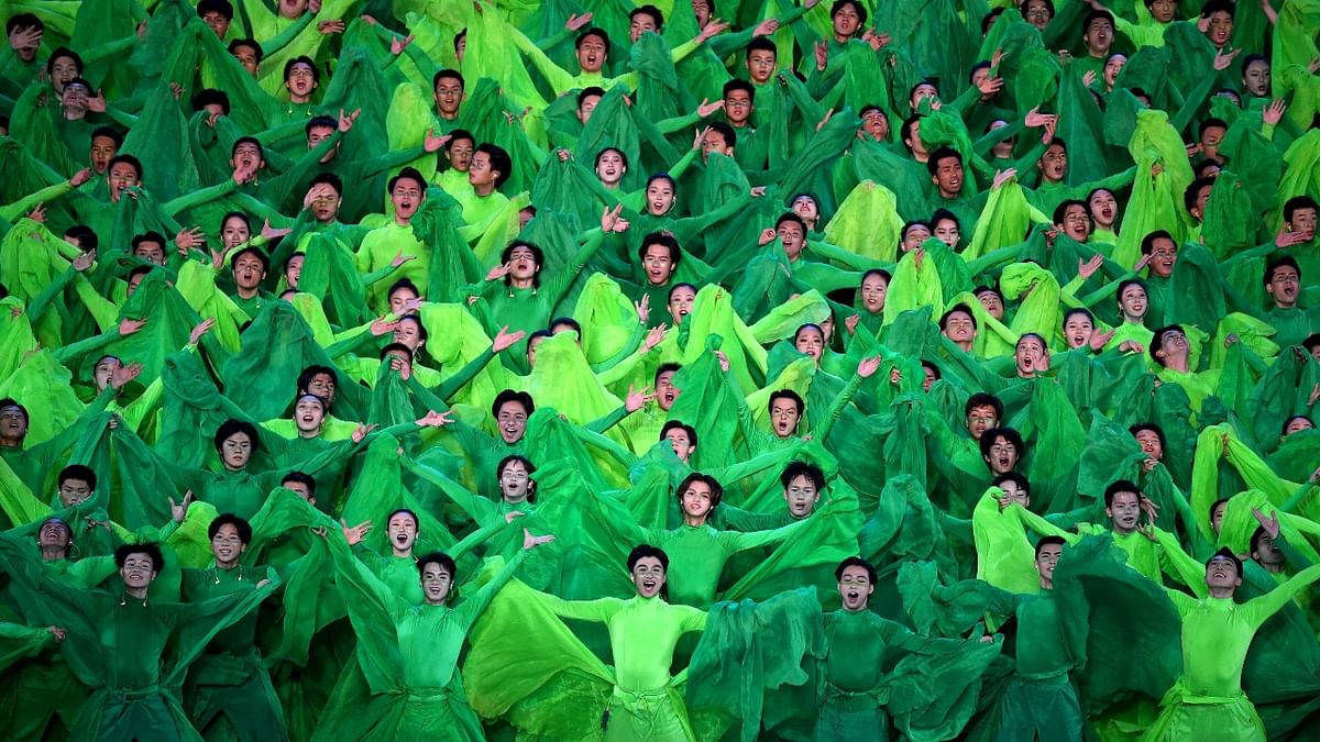 Artists perform during a Cultural Performance as part of the celebration of the 100th Anniversary of the Founding of the Communist Party of China. Credit: AFP Photo