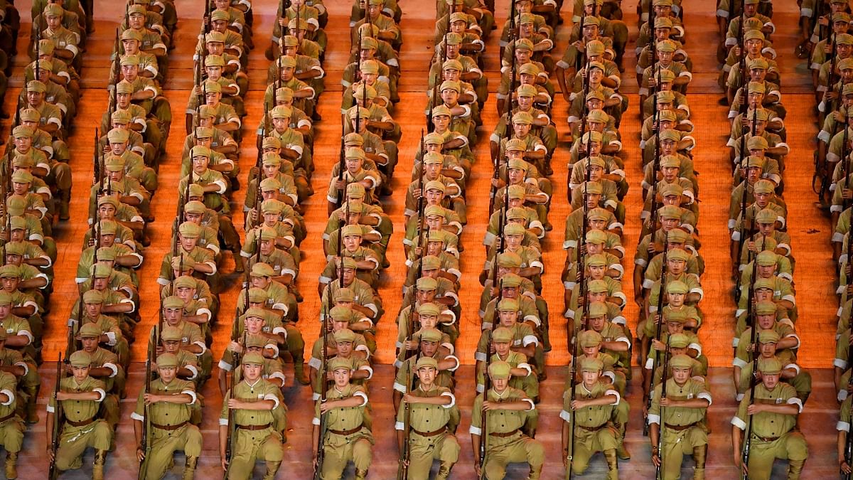 Dance performers perform during a Cultural Performance as part of the celebration of the 100th Anniversary of the Founding of the Communist Party of China, in Beijing. Credit: AFP Photo