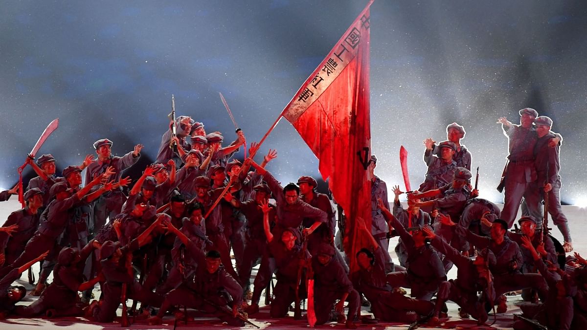 Performers dance during a Cultural Performance as part of the celebration of the 100th Anniversary of the Founding of the Communist Party of China, at the Bird's nest national stadium in Beijing. Credit: AFP Photo