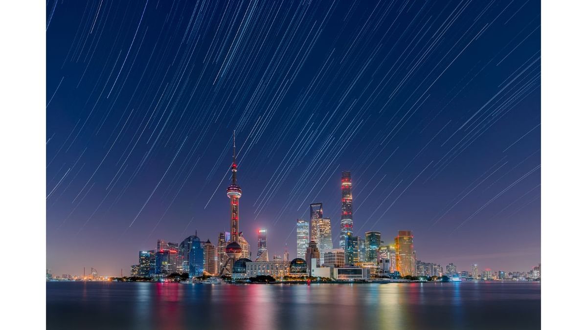 Star trails over the Lujiazui City Skyline. Credit: Daning Kai (China)